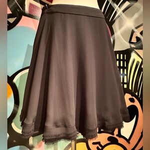 Vince Camuto black skirt with sheer layers and frayed hems, size 2.